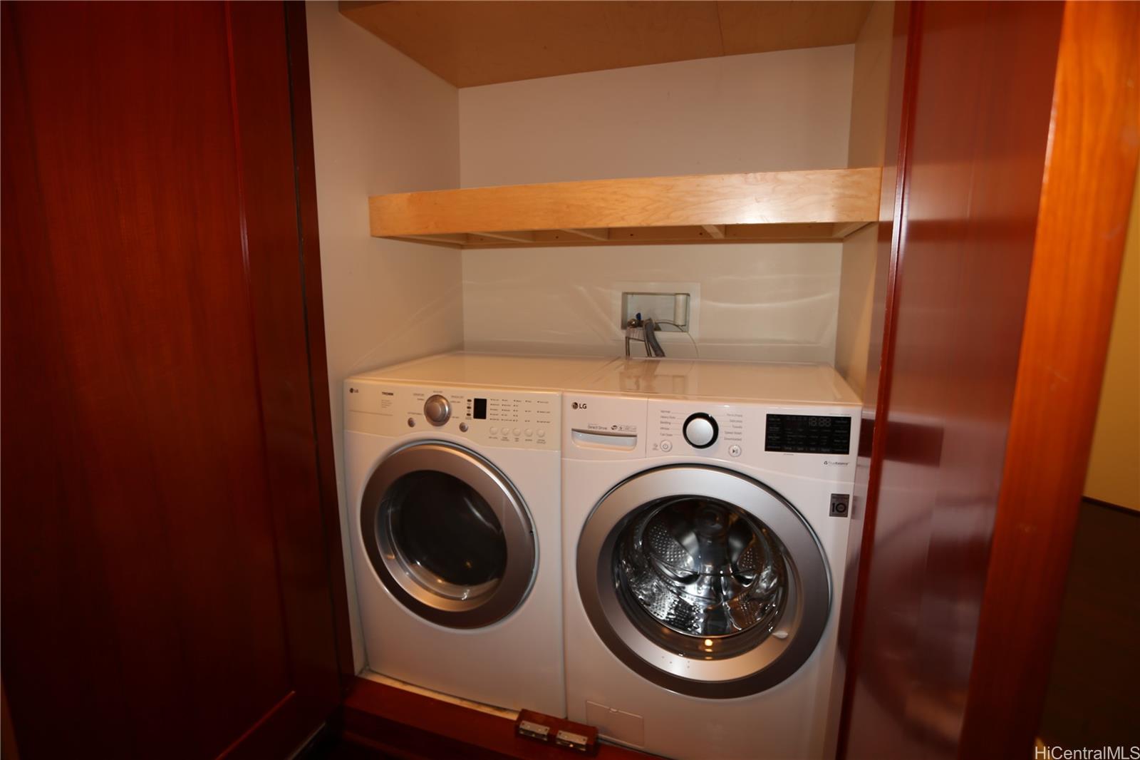 427 Launiu Street, Unit 403 Honolulu, HI 96815 - Photo 11 of 20 a utility room with dryer and washer