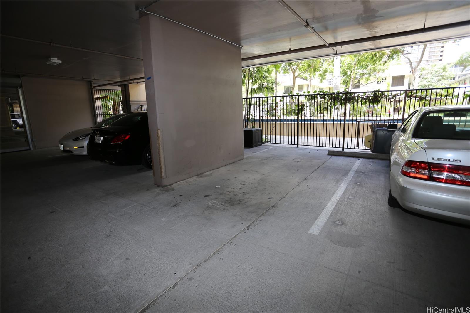427 Launiu Street, Unit 403 Honolulu, HI 96815 - Photo 16 of 20 a view of a car garage from a balcony