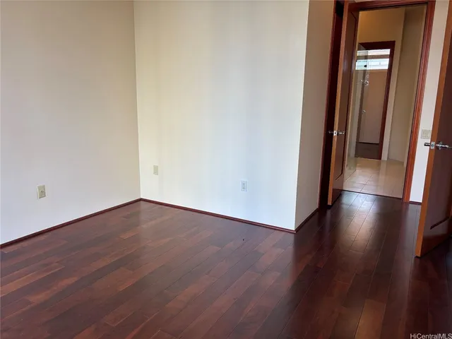 a kitchen with a sink and a stove top oven