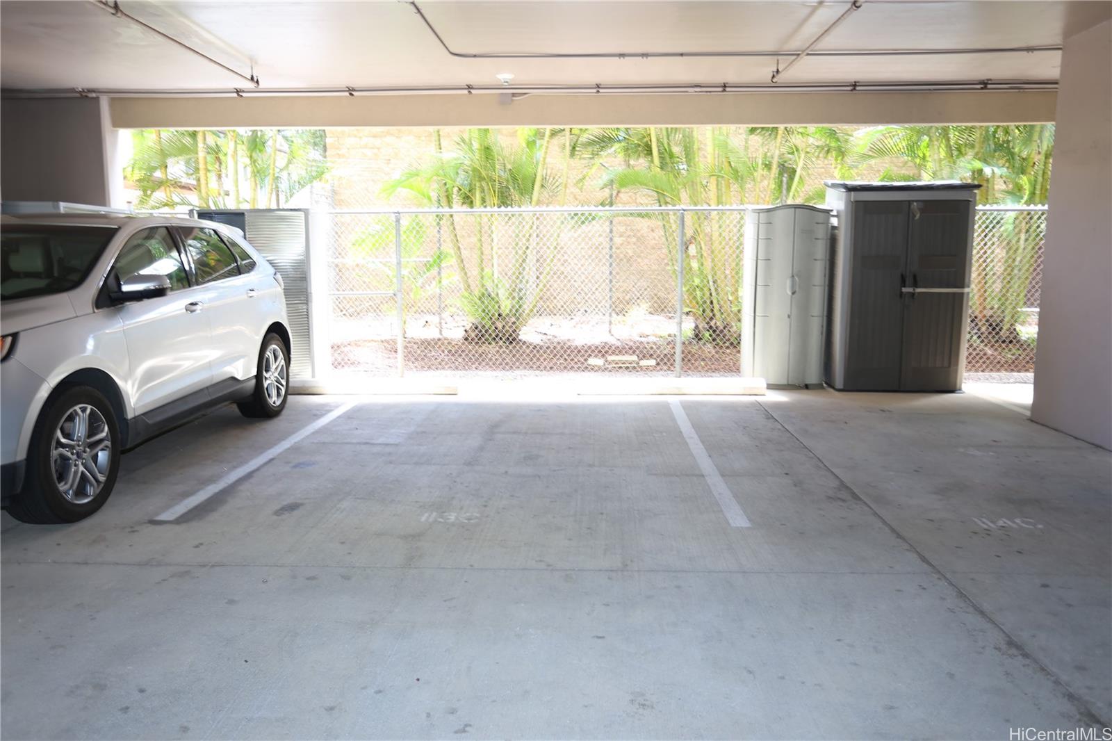 427 Launiu Street, Unit 403 Honolulu, HI 96815 - Photo 17 of 20 a view of garage with a car parked in it
