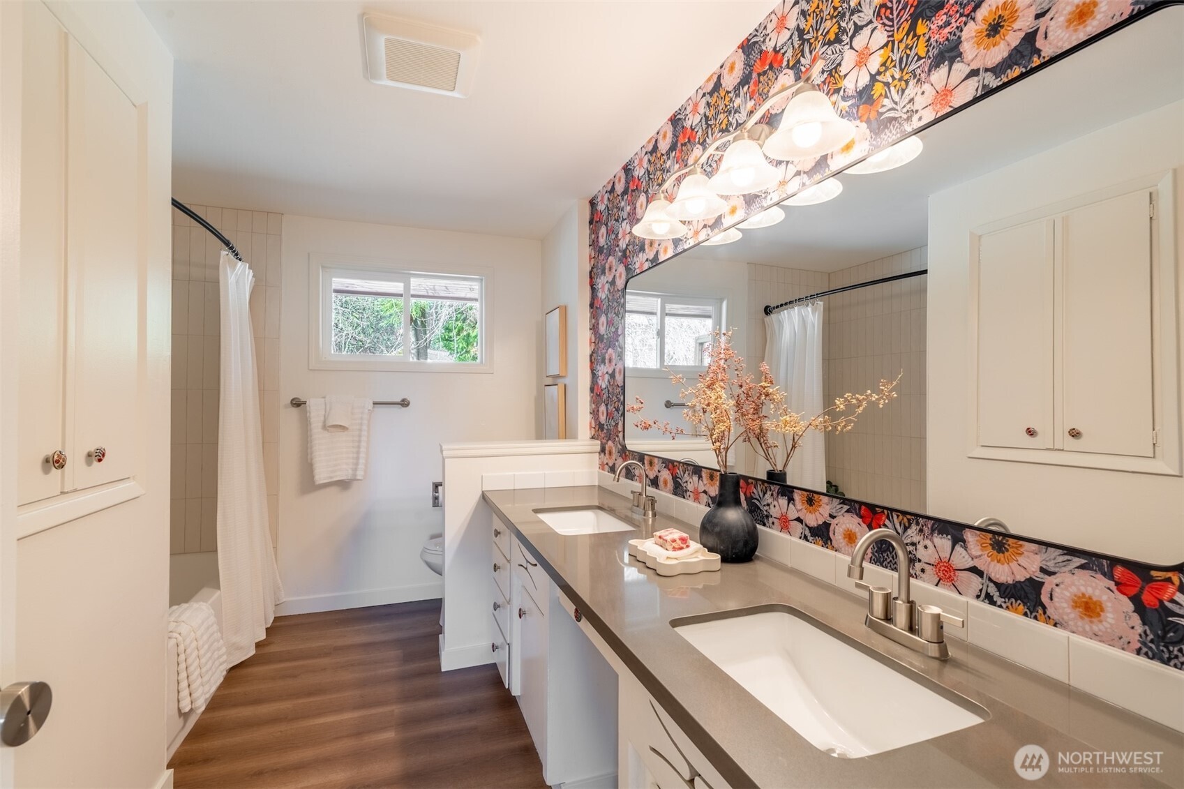 1040 Northeast 154th Street Shoreline, WA 98155 - Photo 14 of 25 a bathroom with a double vanity sink mirror and double