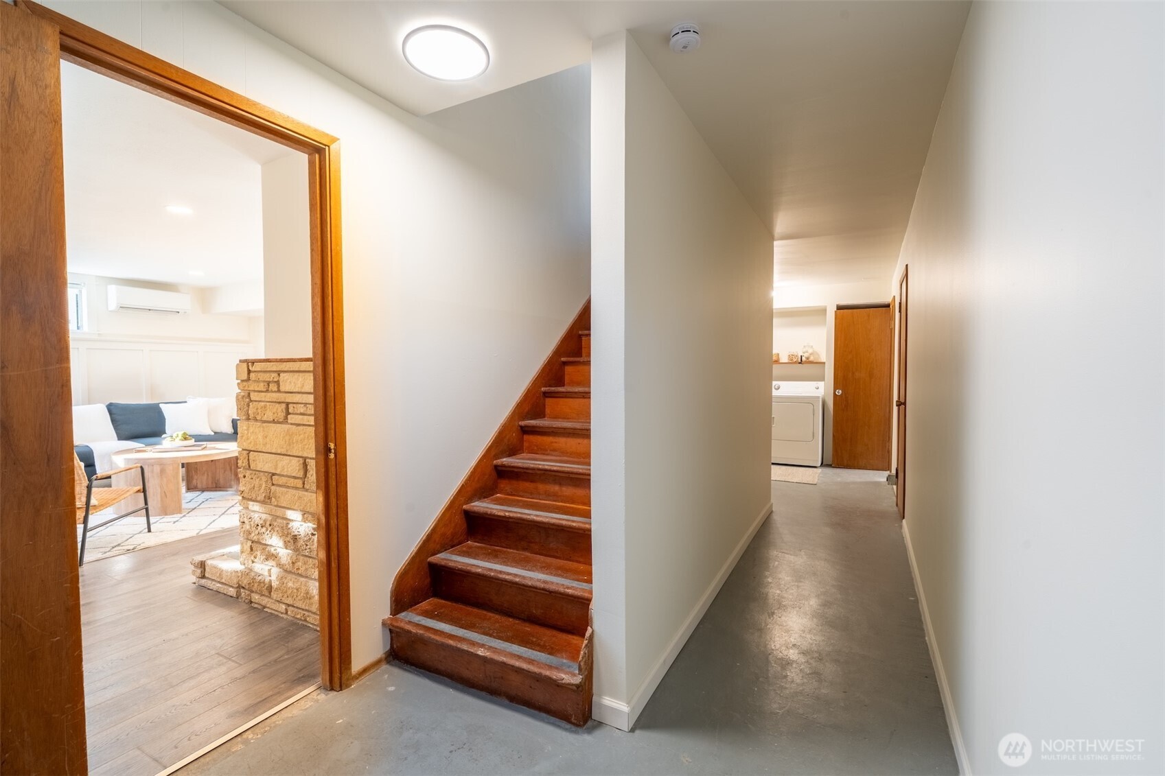 1040 Northeast 154th Street Shoreline, WA 98155 - Photo 15 of 25 a view of a hallway with wooden floor and entryway