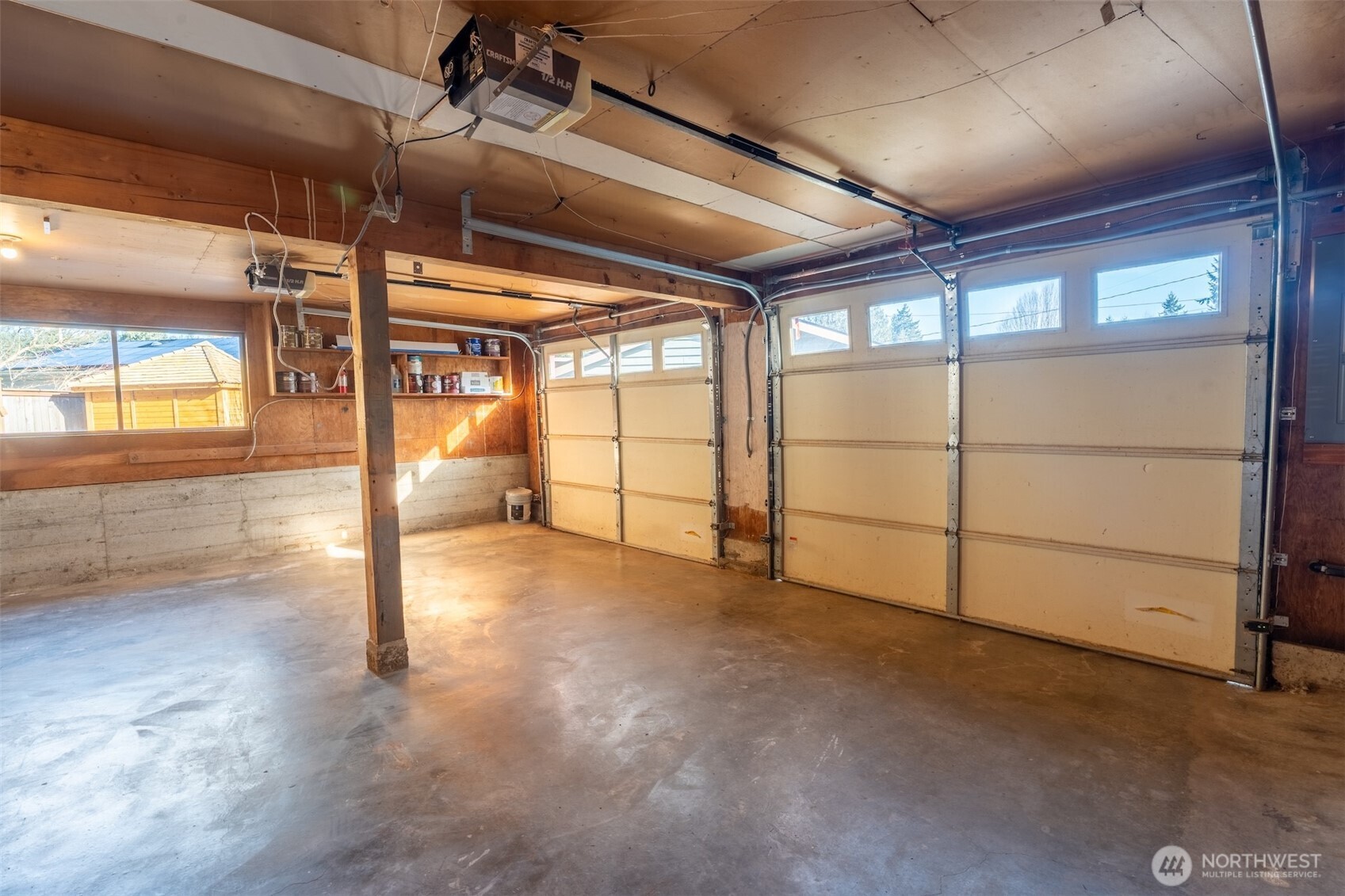1040 Northeast 154th Street Shoreline, WA 98155 - Photo 20 of 25 a view of an empty room with a sliding door