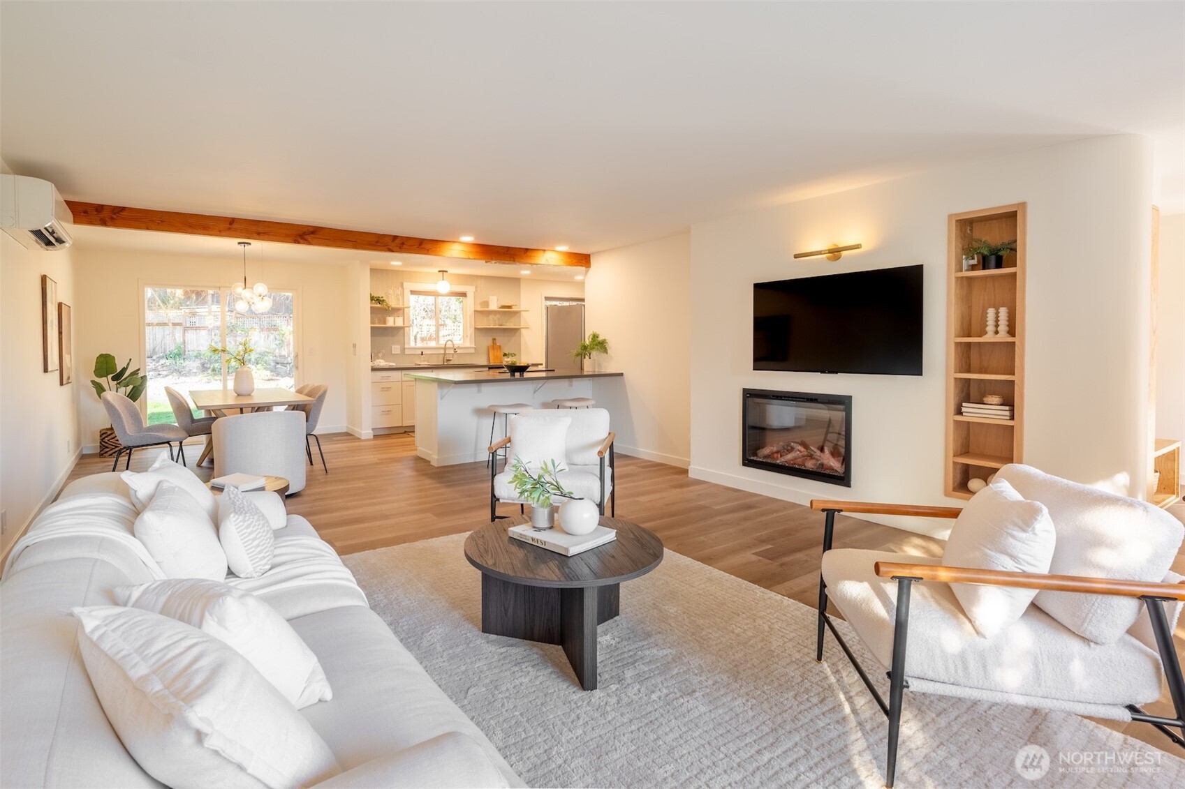 1040 Northeast 154th Street Shoreline, WA 98155 - Photo 5 of 25 a living room with fireplace furniture and a flat screen tv