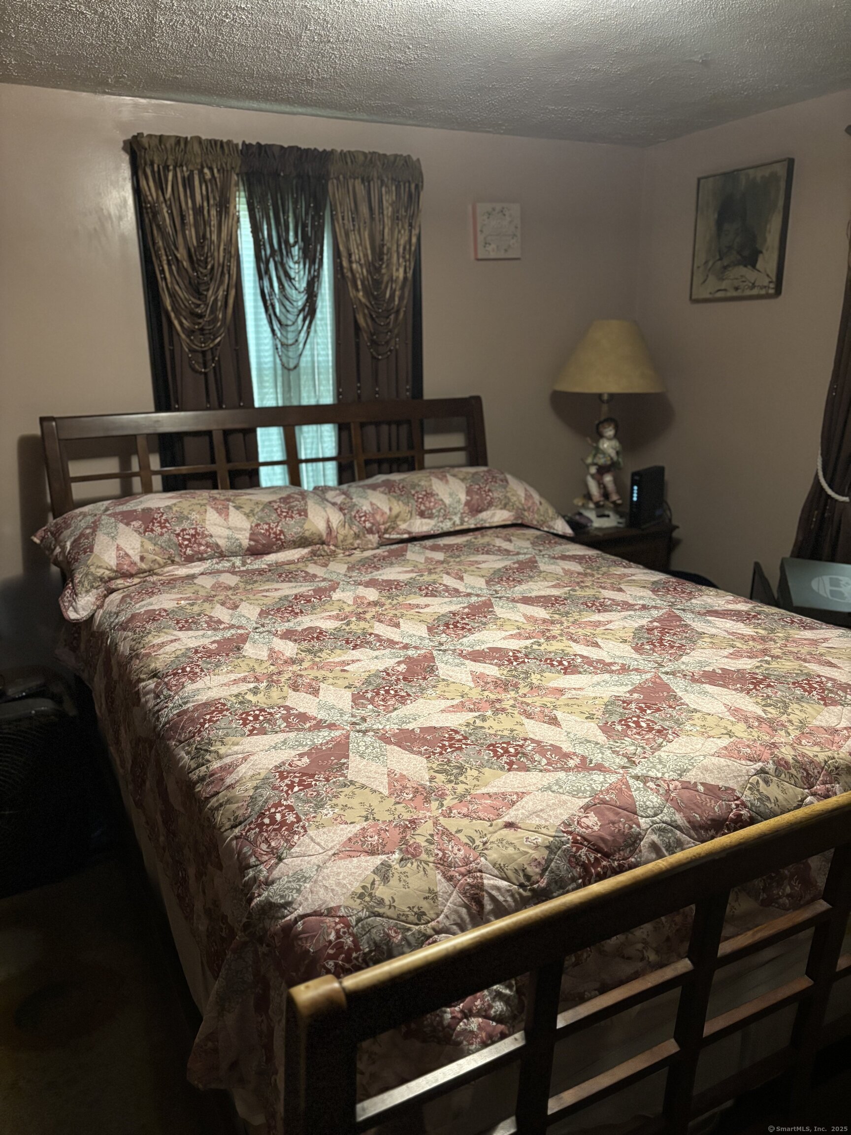 6 Peach Street Waterbury, CT 06708 - Photo 20 of 28 a bedroom with a bed and window