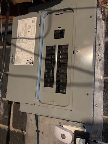 a bathroom with a shower and mirror