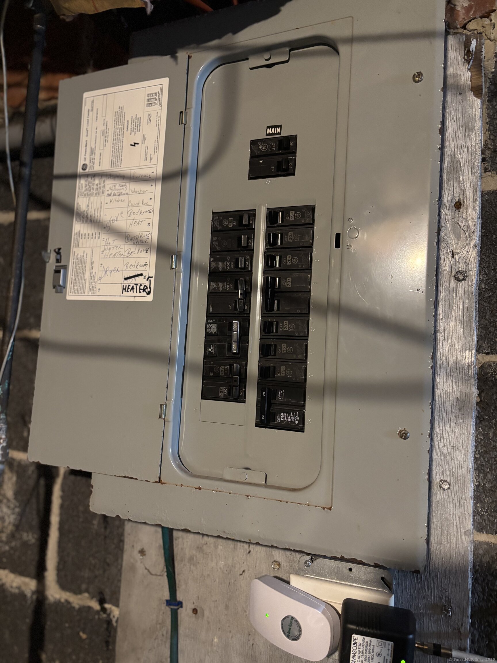 6 Peach Street Waterbury, CT 06708 - Photo 24 of 28 a bathroom with a shower and mirror