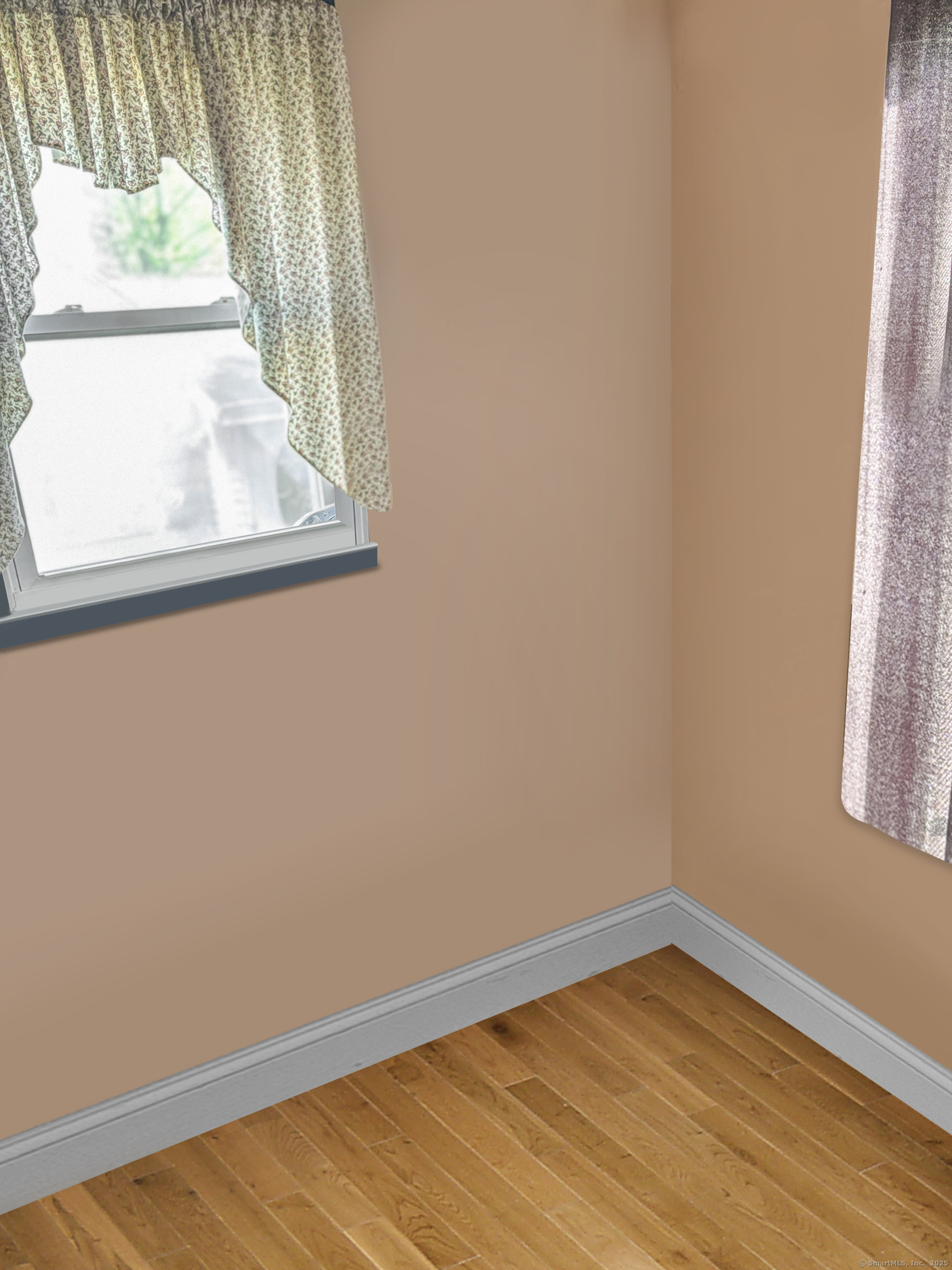 6 Peach Street Waterbury, CT 06708 - Photo 7 of 28 a view of a small space with wooden floor and a window