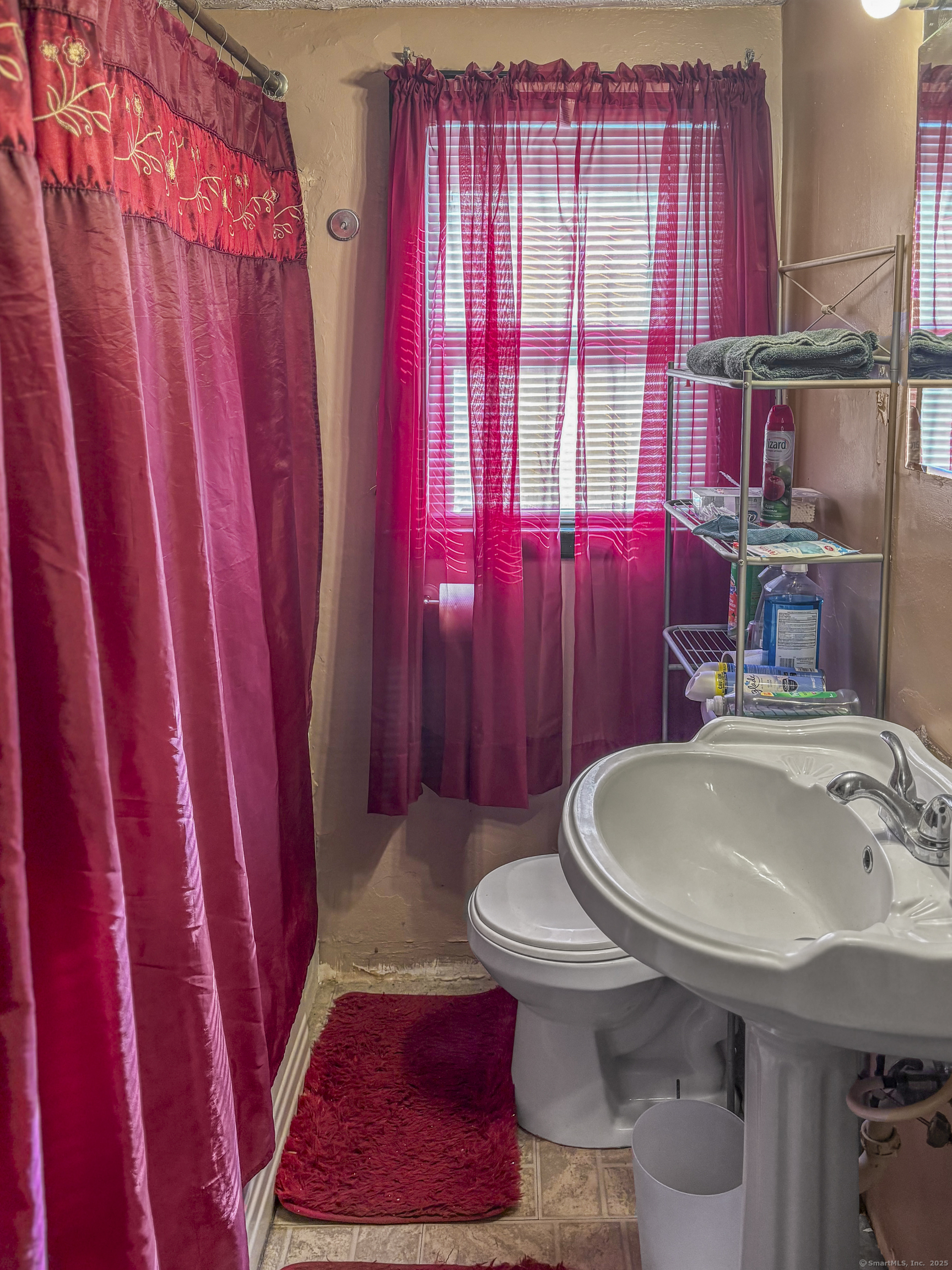 6 Peach Street Waterbury, CT 06708 - Photo 8 of 28 a bathroom with a sink toilet and shower