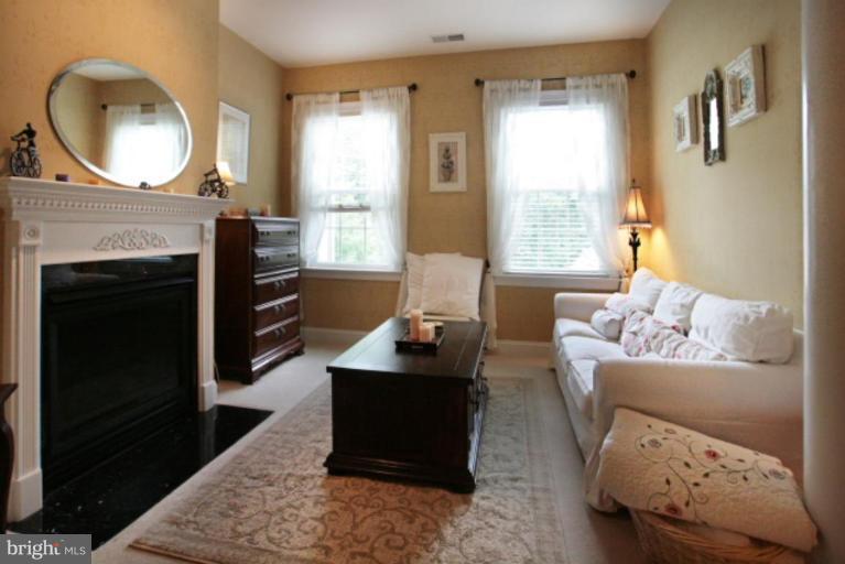 3744 Baker School House Road Manchester, MD 21102 - Photo 15 of 29 a living room with furniture and a fireplace