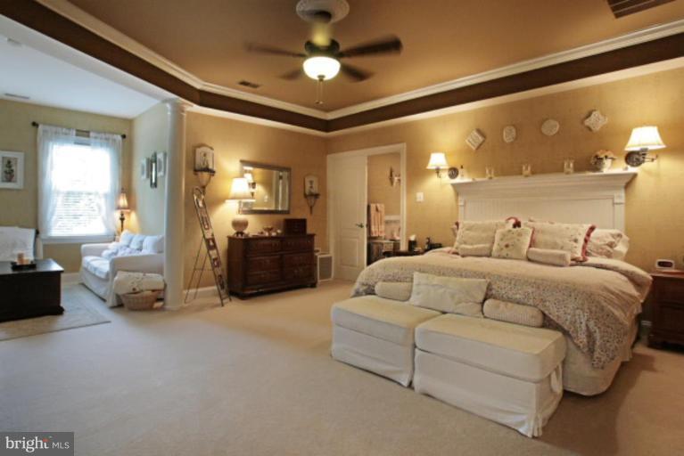 3744 Baker School House Road Manchester, MD 21102 - Photo 3 of 29 a spacious bedroom with a bed and ceiling fan