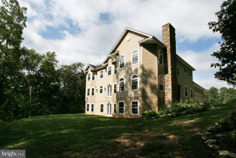 3744 Baker School House Road Manchester, MD 21102 - Photo 27 of 29 a view of a building with a yard