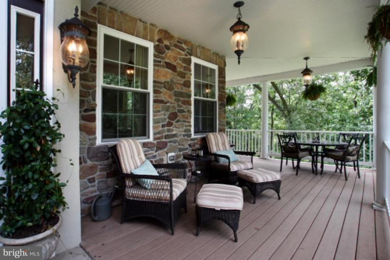 3744 Baker School House Road Manchester, MD 21102 - Photo 5 of 29 a outdoor space with patio the couches and a dining table with garden view