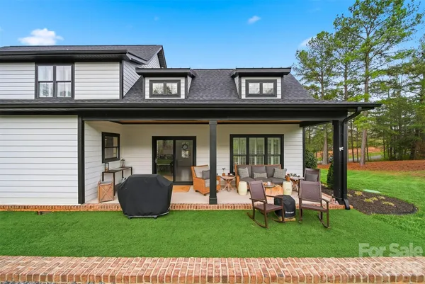 a view of a house with patio