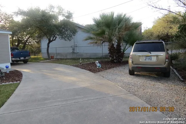 a car parked in front of a house