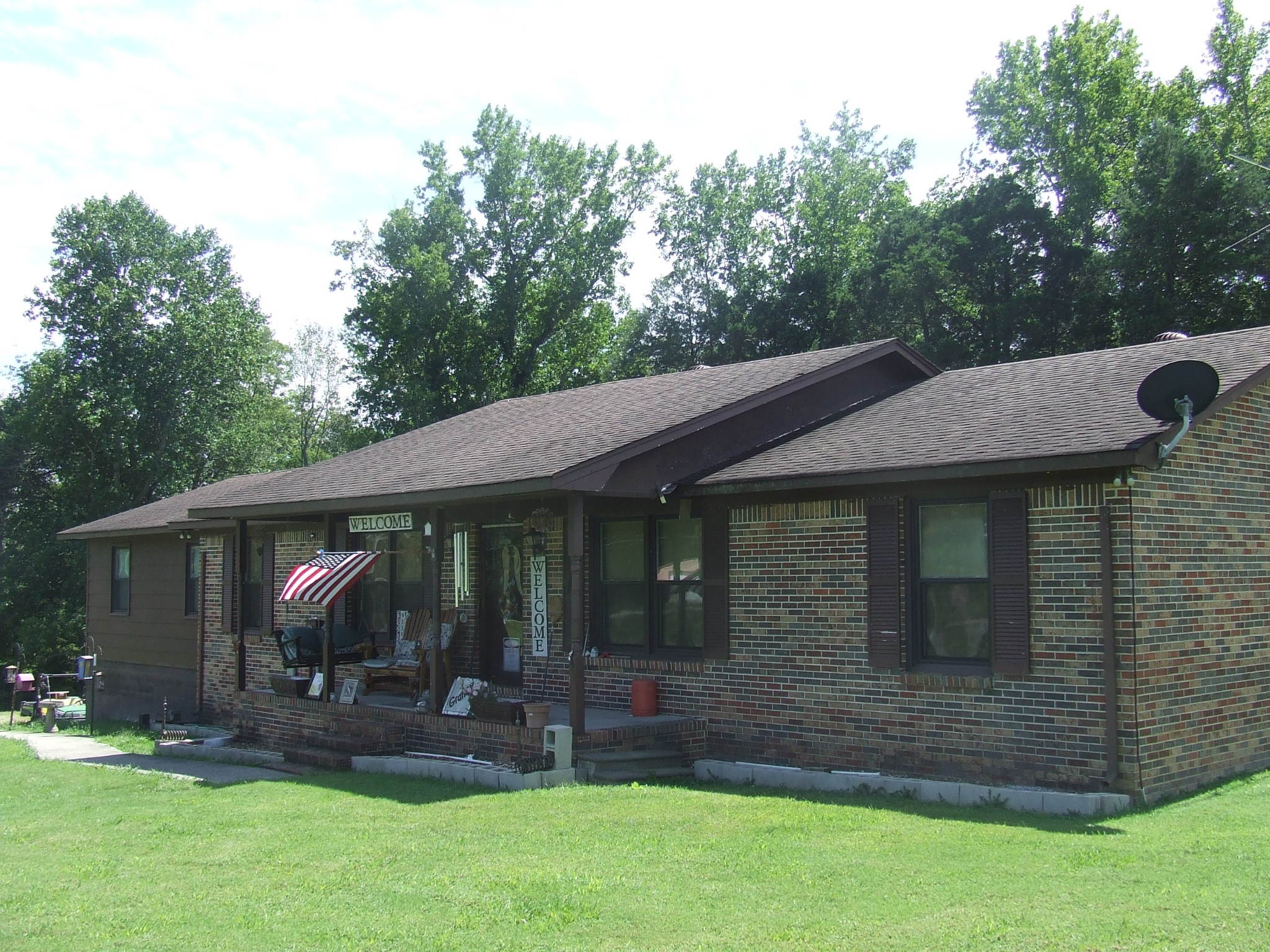 63 Sneed Road McMinnville, TN 37110 - Photo 1 of 22 a view of a back yard of the house