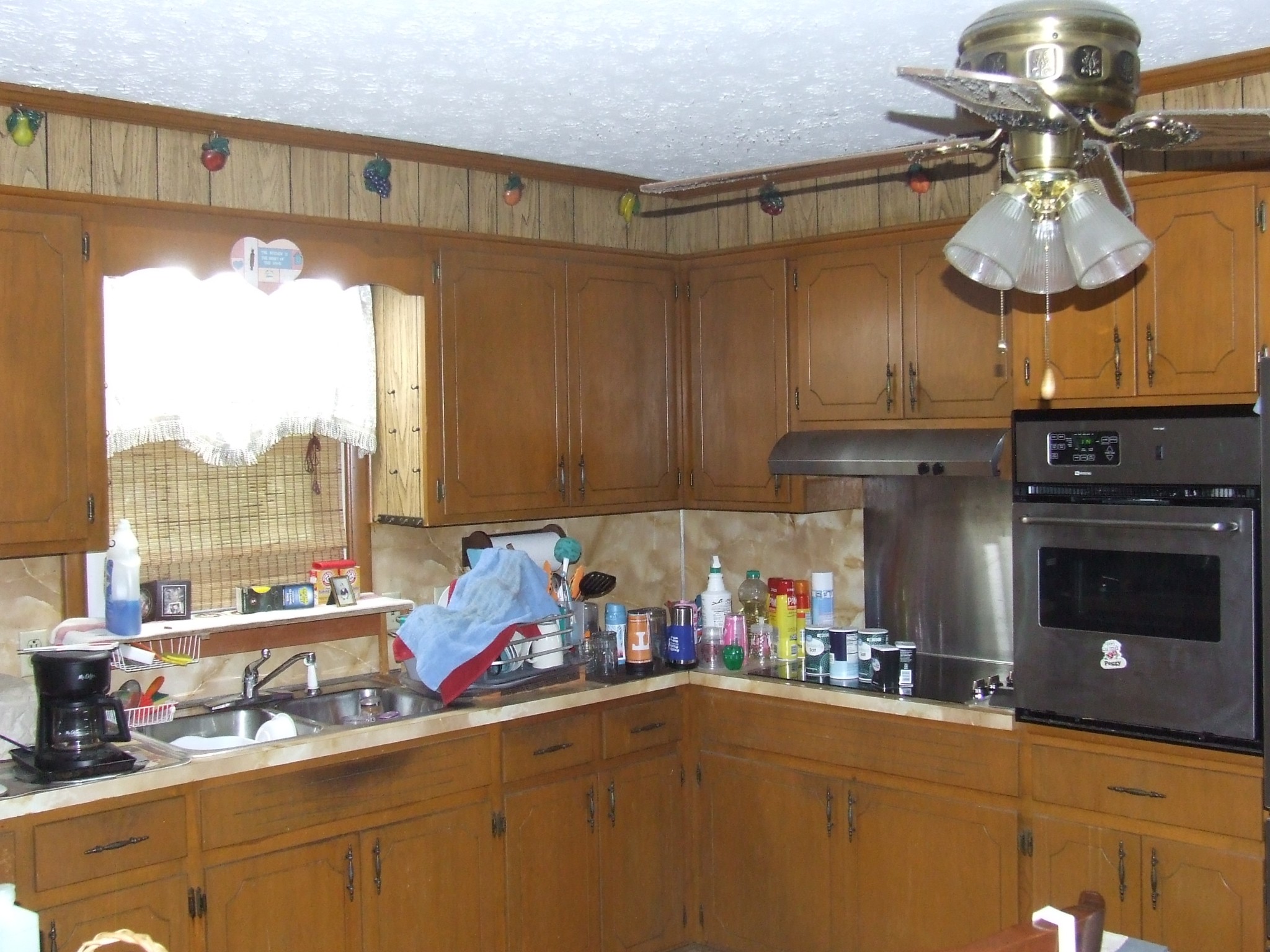 63 Sneed Road McMinnville, TN 37110 - Photo 13 of 22 a kitchen with a sink a stove and a refrigerator