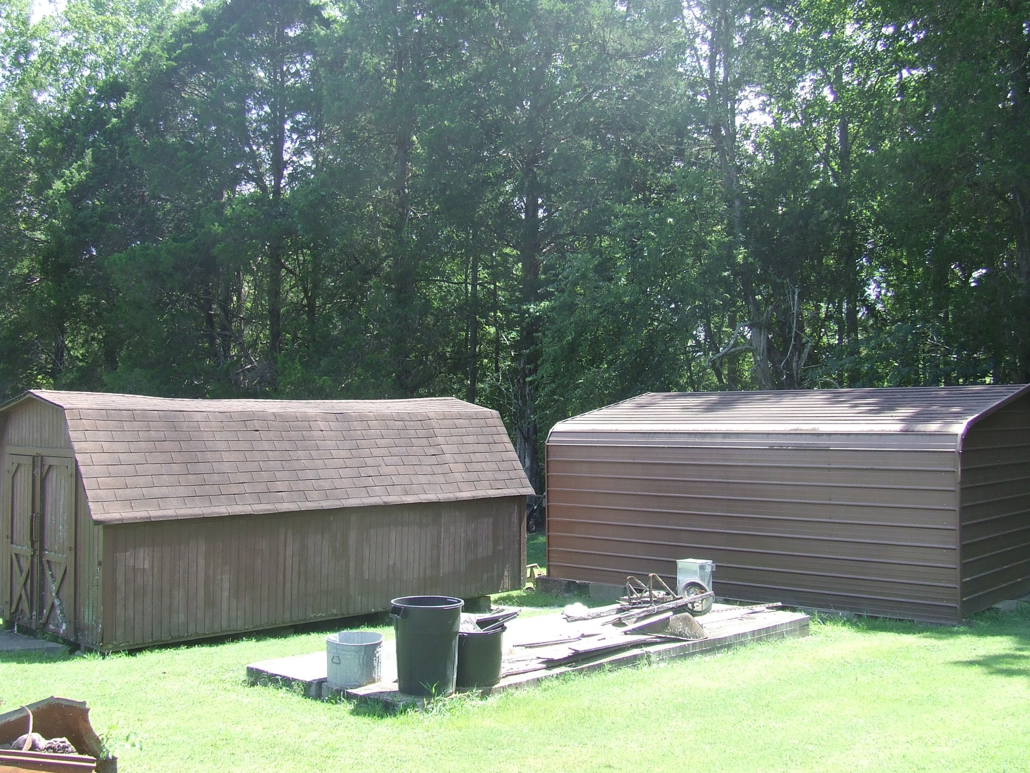63 Sneed Road McMinnville, TN 37110 - Photo 21 of 22 a view of a backyard with two chairs and a table