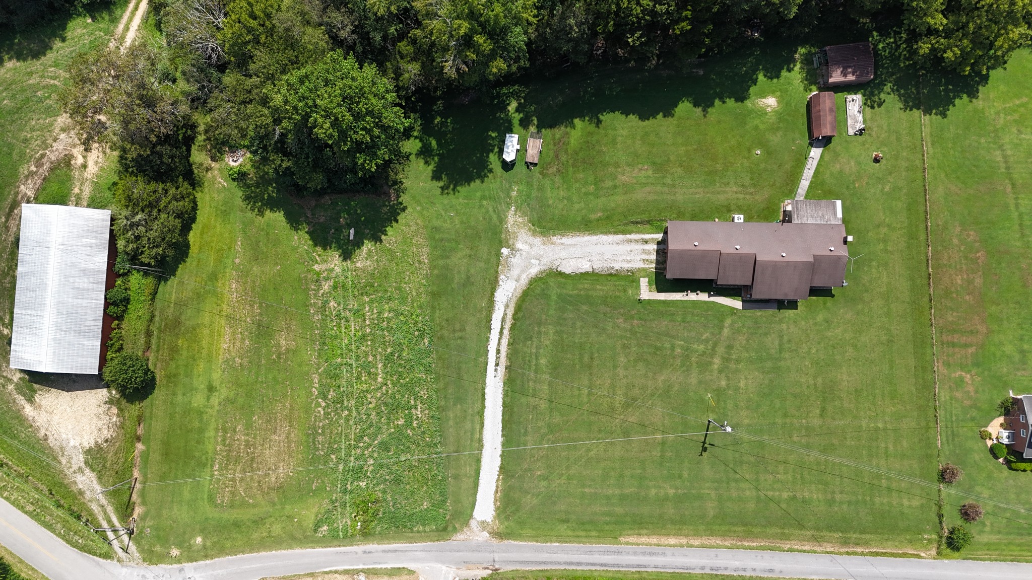 63 Sneed Road McMinnville, TN 37110 - Photo 7 of 22 an aerial view of a house having swimming pool