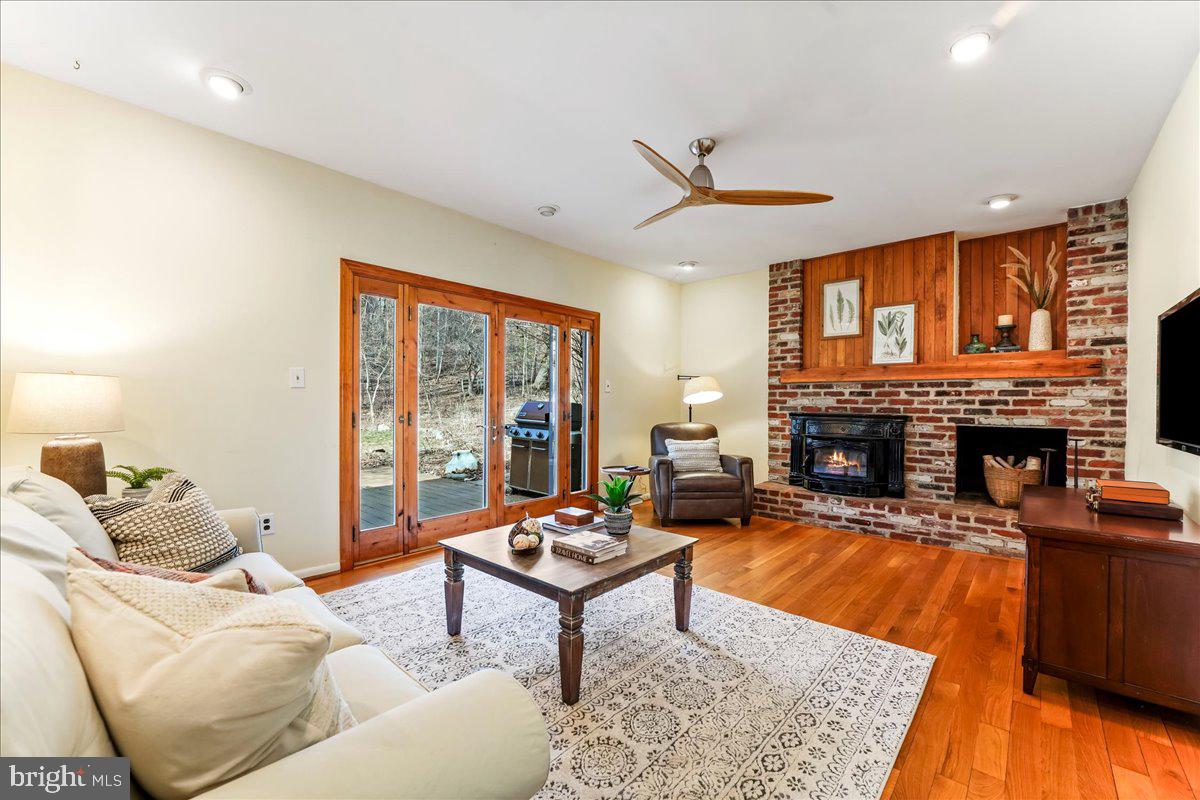 716 South Roberts Road Bryn Mawr, PA 19010 - Photo 15 of 39 a living room with furniture fireplace and a large window