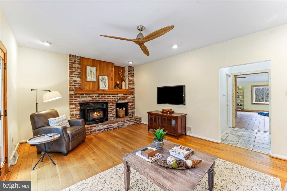 716 South Roberts Road Bryn Mawr, PA 19010 - Photo 17 of 39 a living room with furniture and a fireplace