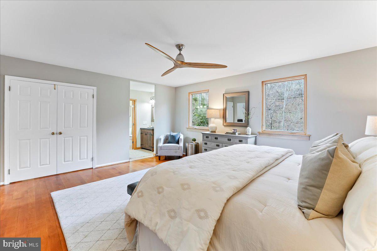 716 South Roberts Road Bryn Mawr, PA 19010 - Photo 24 of 39 a spacious bedroom with a bed a window and dresser