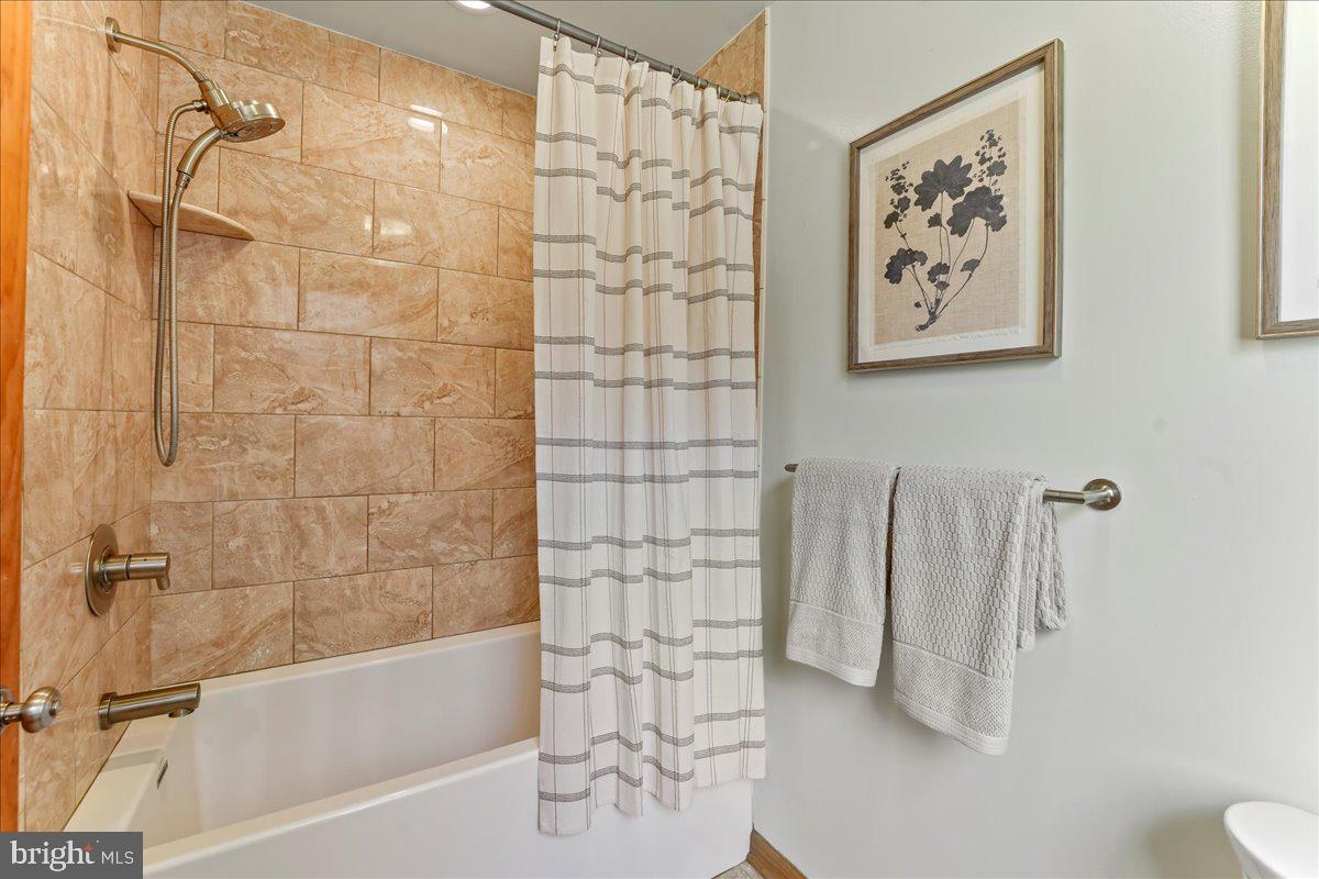 716 South Roberts Road Bryn Mawr, PA 19010 - Photo 27 of 39 a bathroom with a shower and a bathtub