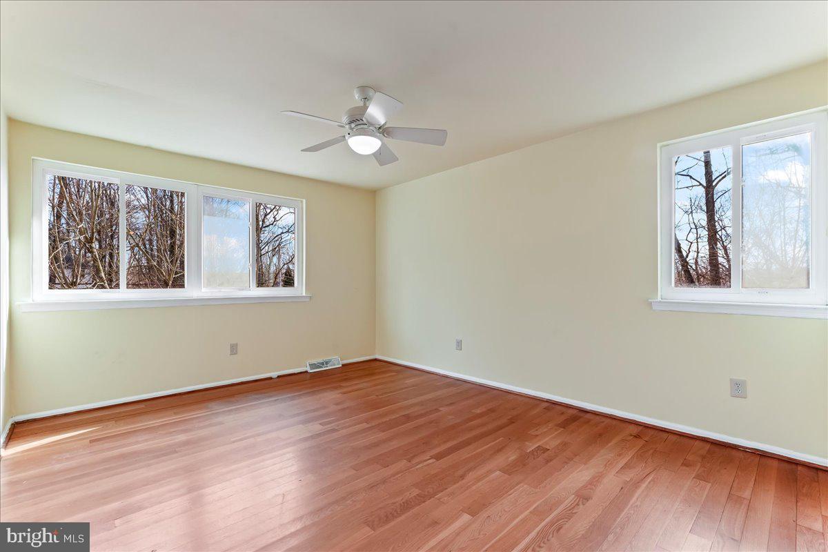 716 South Roberts Road Bryn Mawr, PA 19010 - Photo 31 of 39 a view of empty room with wooden floor and fan