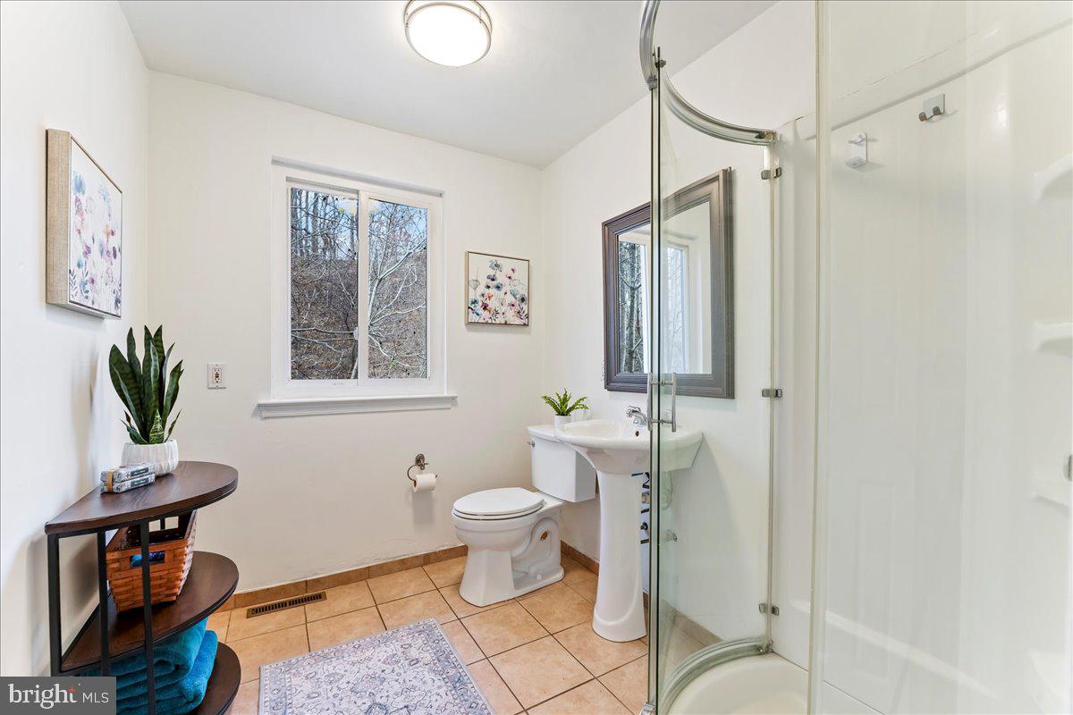 716 South Roberts Road Bryn Mawr, PA 19010 - Photo 33 of 39 a living room with furniture a window and a table
