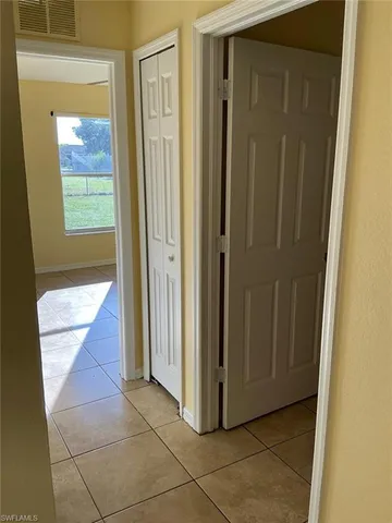 a view of a bathroom with a glass door