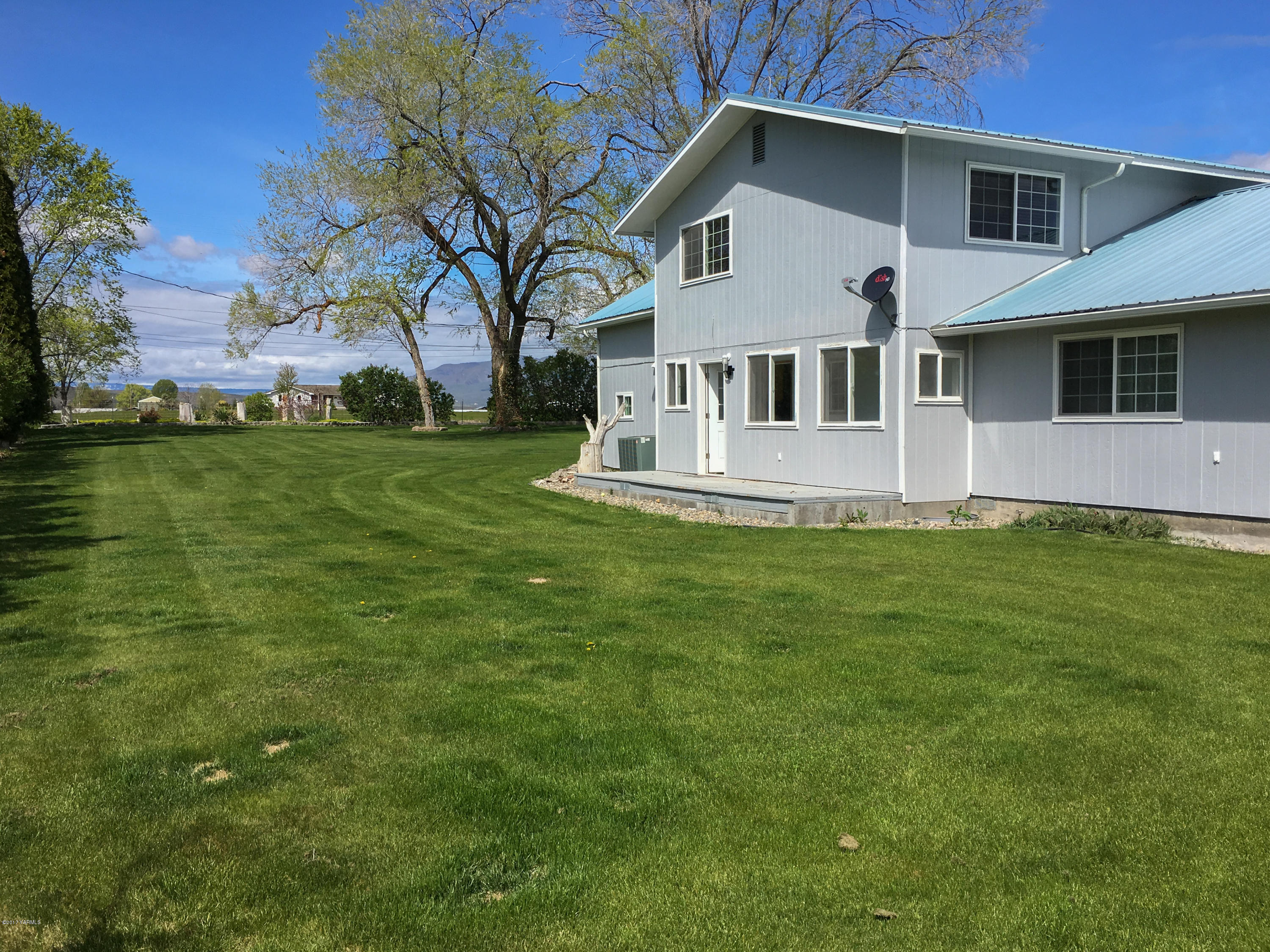 a house view with a garden space