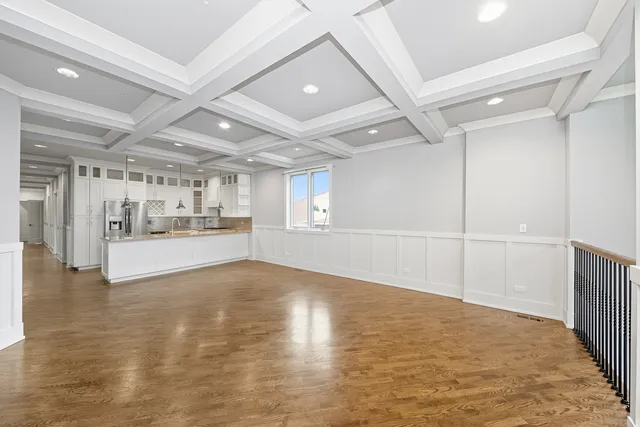 a view of a livingroom with wooden floor