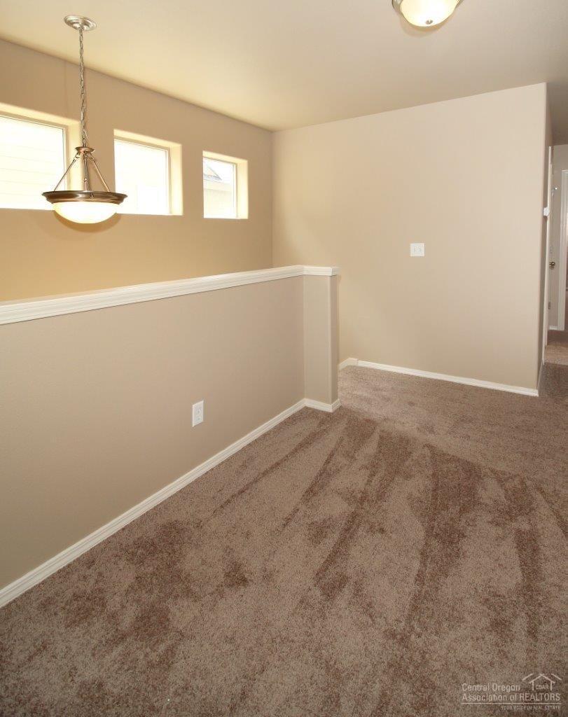 62004 Quail Run Place Bend, OR 97701 - Photo 9 of 22 Landing area or bonus room