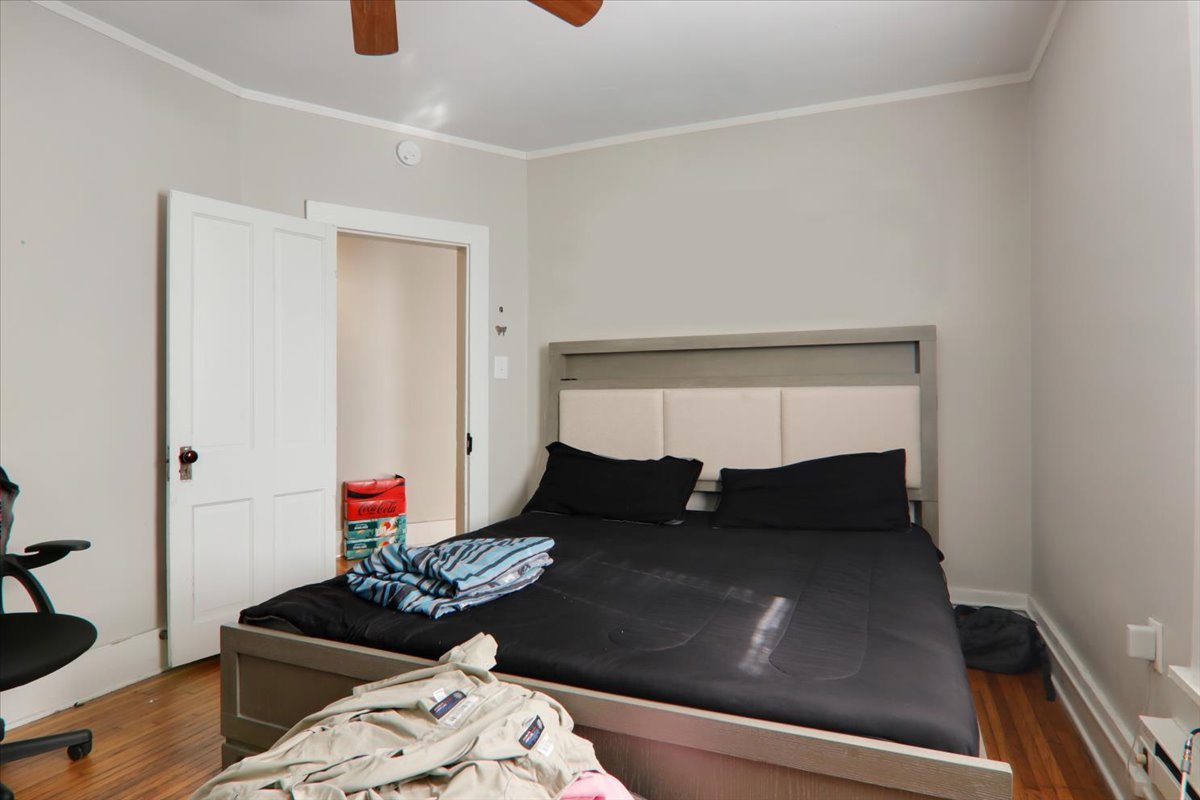 910 North Center Street Bloomington, IL 61701 - Photo 26 of 26 a living room with furniture and a potted plant on a dresser