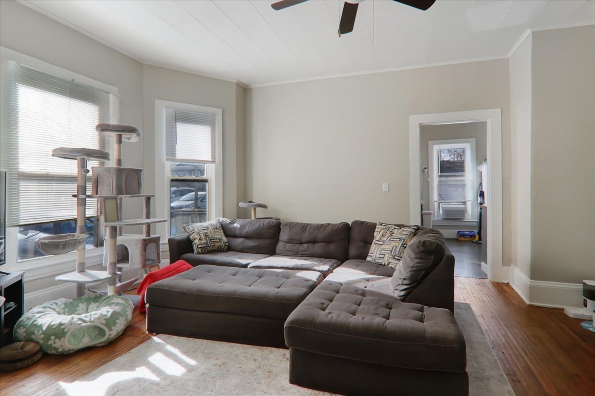 910 North Center Street Bloomington, IL 61701 - Photo 6 of 26 a living room with furniture and a large window