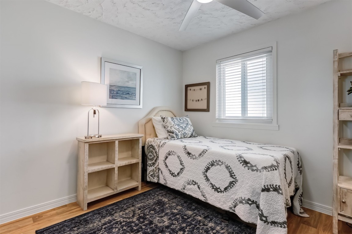 338 Tarpon Avenue Fernandina Beach, FL 32034 - Photo 25 of 36 a bedroom with a bed and a window