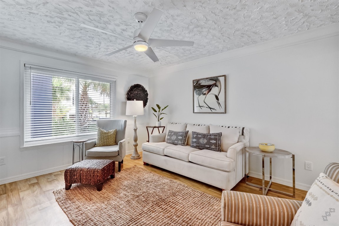 338 Tarpon Avenue Fernandina Beach, FL 32034 - Photo 7 of 36 a living room with furniture and a window