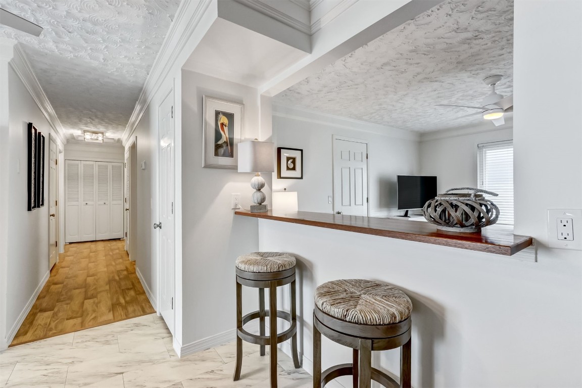 338 Tarpon Avenue Fernandina Beach, FL 32034 - Photo 9 of 36 a living room with furniture and a table