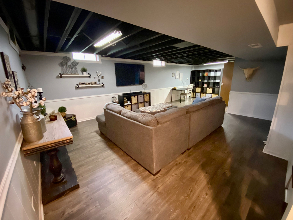 26 Winrock Road Montgomery, IL 60538 - Photo 19 of 24 a living room with furniture and a flat screen tv