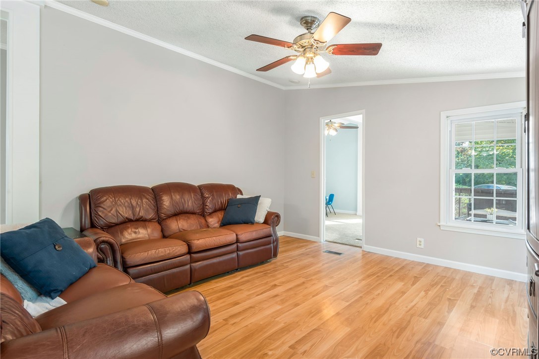 2382 Pony Farm Road Maidens, VA 23102 - Photo 12 of 34 a living room with furniture and a large window