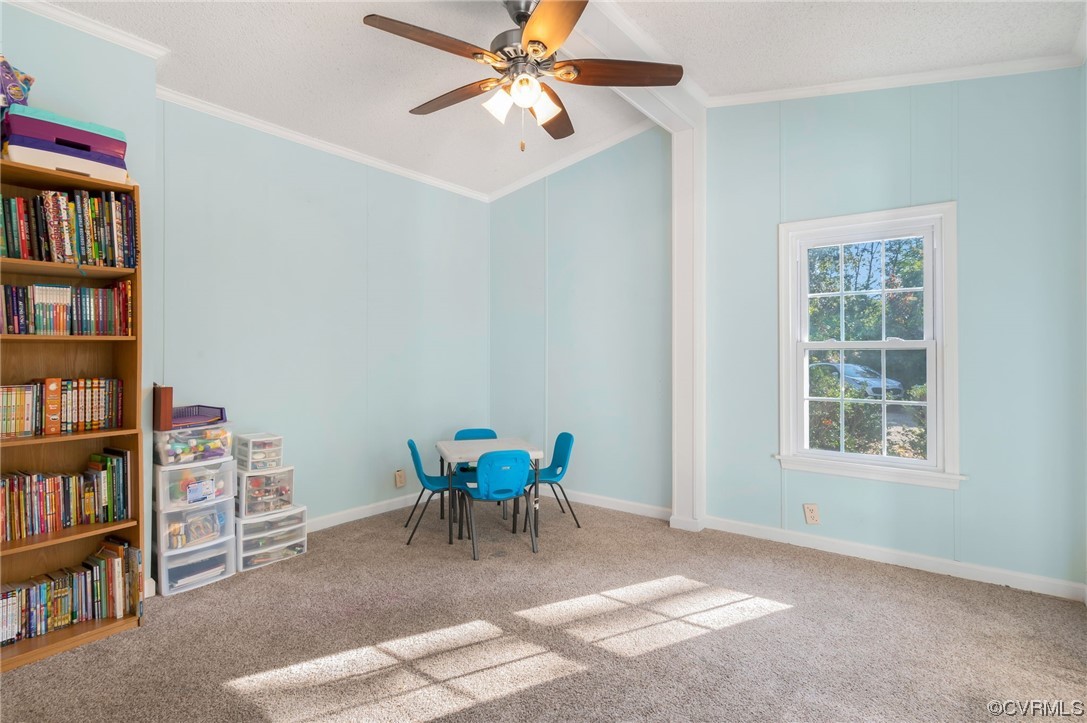 2382 Pony Farm Road Maidens, VA 23102 - Photo 13 of 34 a dining room with furniture and a book shelf
