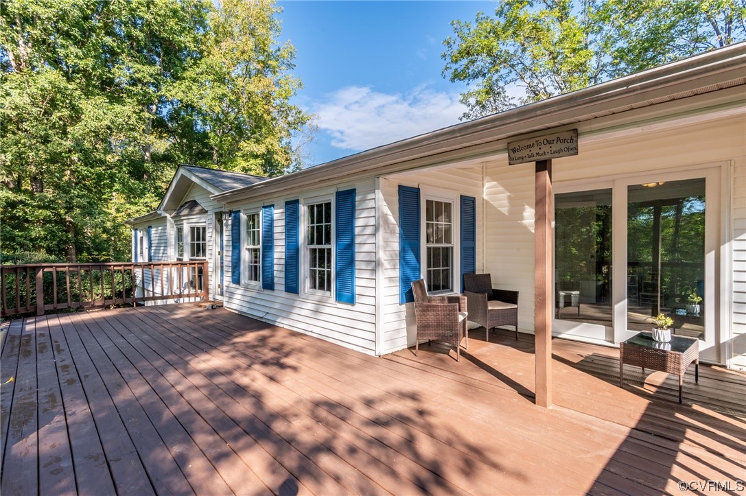 2382 Pony Farm Road Maidens, VA 23102 - Photo 2 of 34 a view of a house with backyard patio and balcony