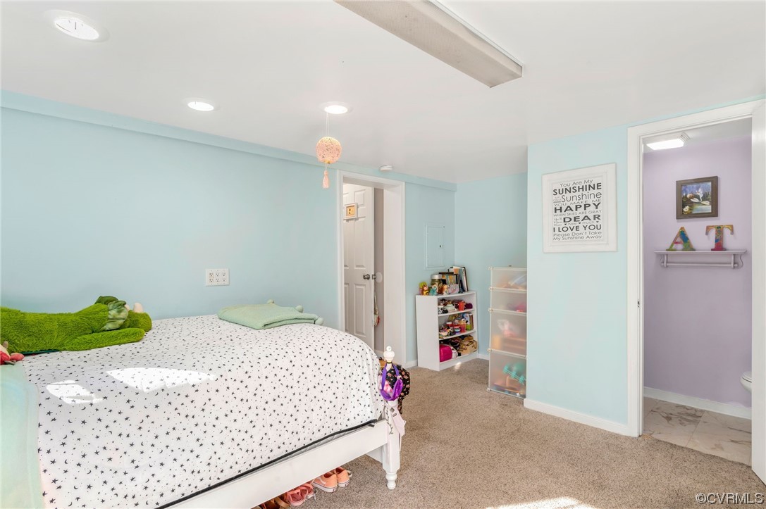 2382 Pony Farm Road Maidens, VA 23102 - Photo 24 of 34 a bedroom with a bed and a walk in closet