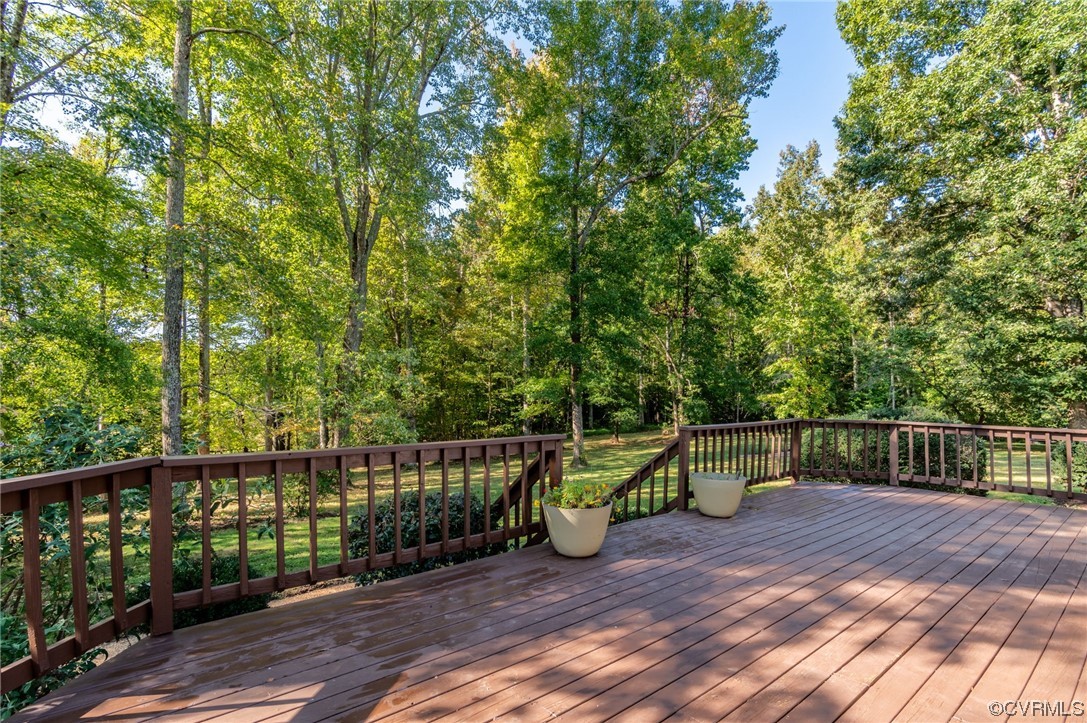 2382 Pony Farm Road Maidens, VA 23102 - Photo 25 of 34 a view of deck with two chairs and wooden fence