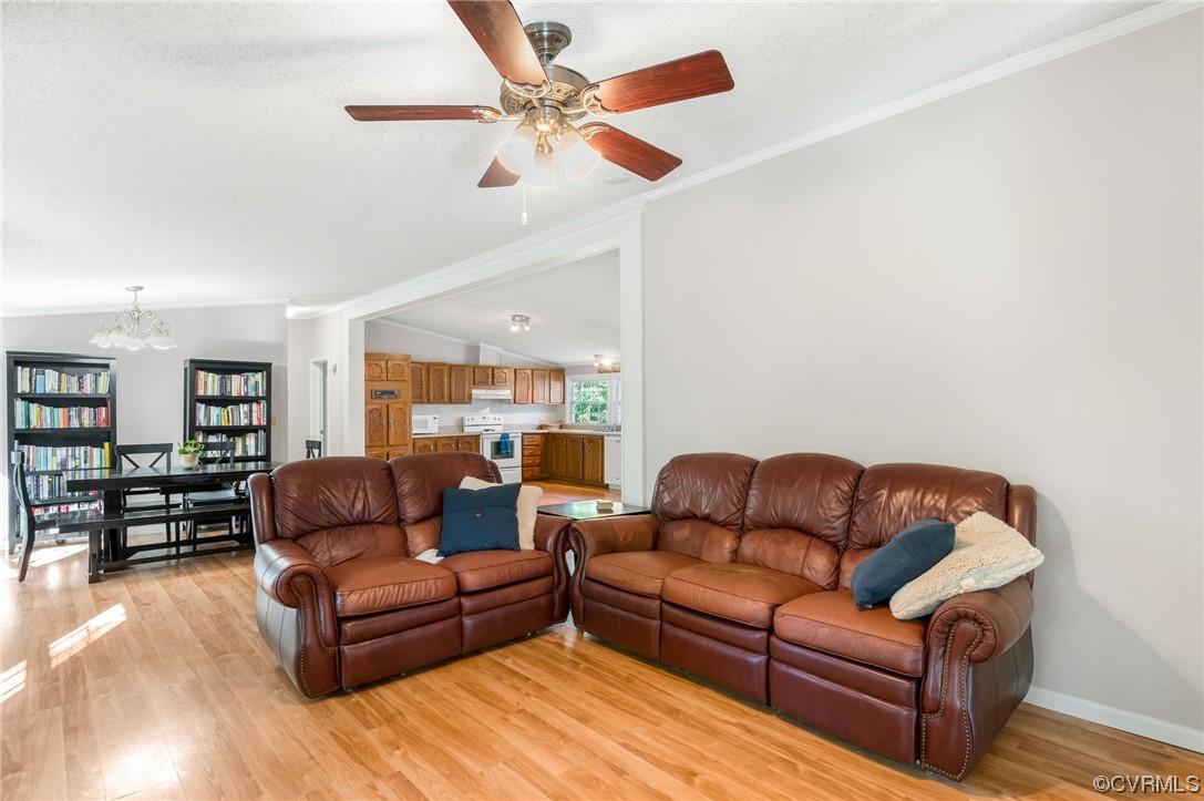 2382 Pony Farm Road Maidens, VA 23102 - Photo 10 of 34 a living room with furniture ceiling fan and a rug