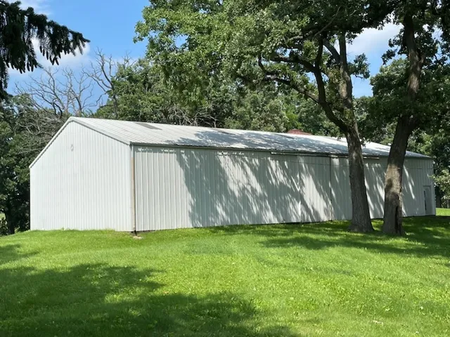 a view of backyard with green space