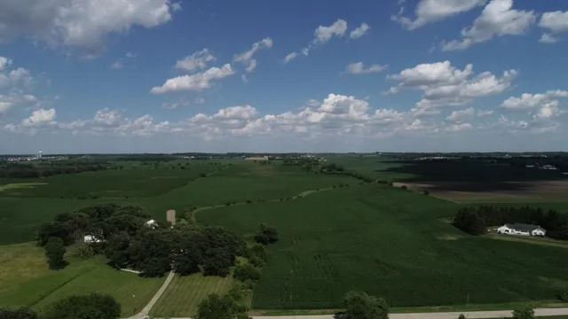 a view of a lake with a yard