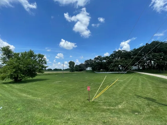 a view of a golf course with a lake