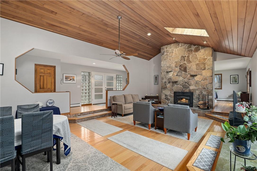 156 Collabar Road Montgomery, NY 12549 - Photo 1 of 1 a living room with fireplace furniture and a fireplace