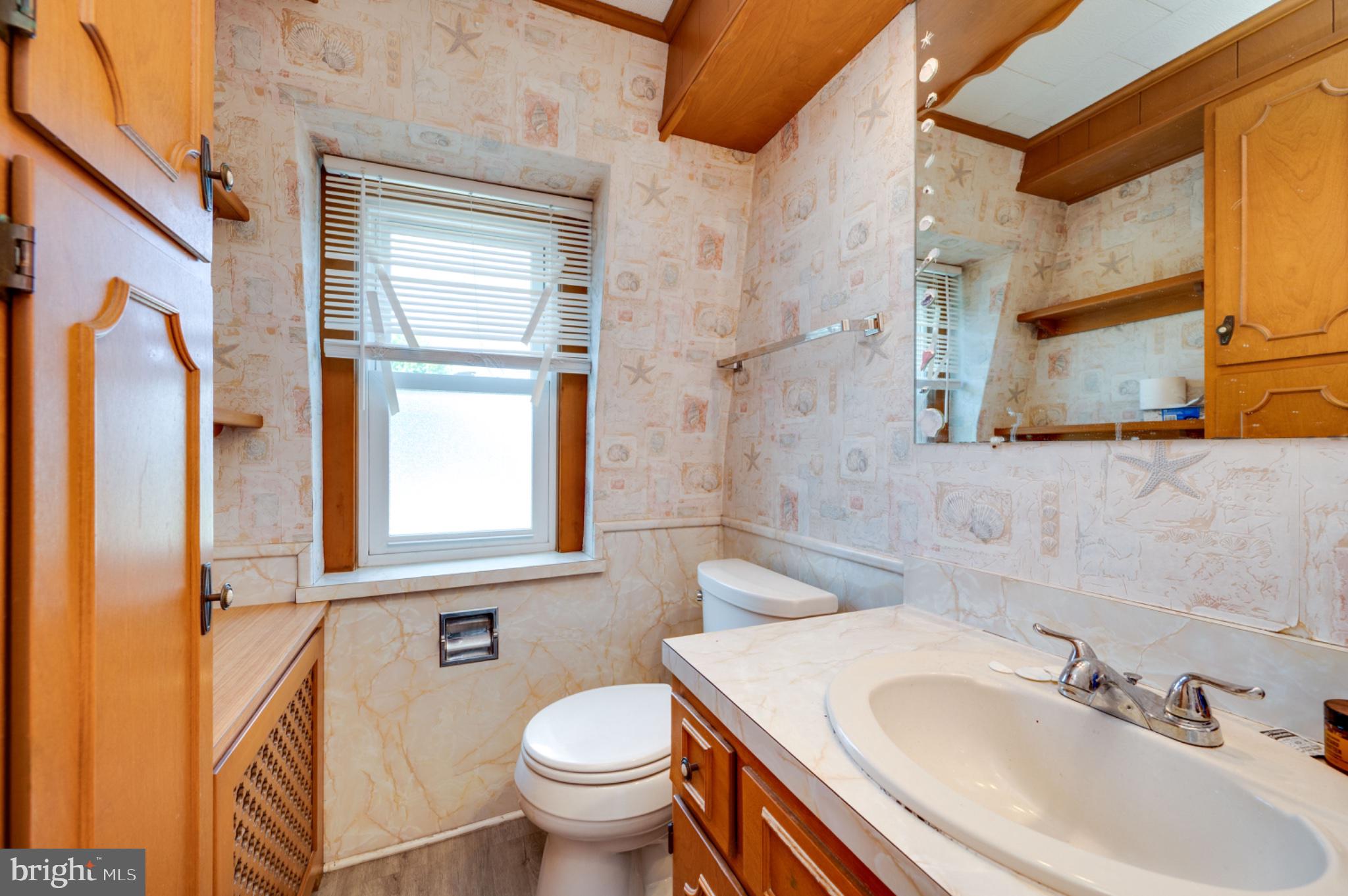1448 Luzerne Street Reading, PA 19601 - Photo 17 of 32 Charming bathroom with coastal vibes.
